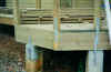 Exterior corner and post straps connect the foundation to the roof joists.