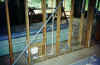 Interior wall with metal diagonal straps is used on all the interior walls and is nailed with specially harded nails.